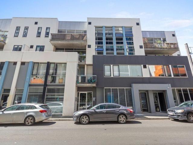 ELEVATED ONE BEDROOM WITH SECURE PARKING