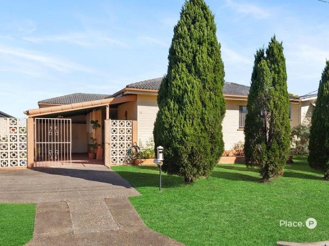 Elevated Opportunity with Sweeping Suburban Views