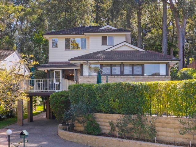 Elevated outlooks, poolside privacy and a versatile lower level