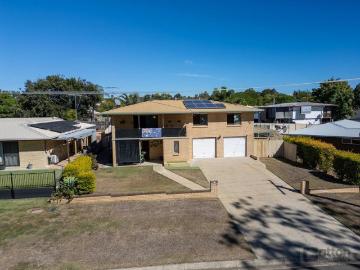 ELEVATED PARKFRONT LIVING WITH A SPARKLING POOL, MULTIPLE ENTERTAINING ZONES & VERSATILE FAMILY SPACES