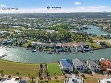 Elevated position, flat land ready to build on. Best value buy in sanctuary cove