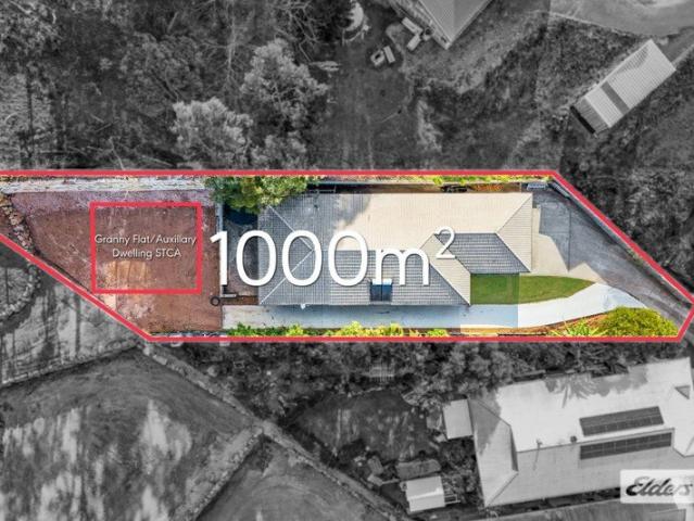 Elevated Position, Generous Land and Future Potential!