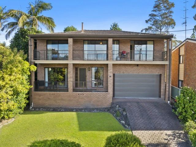 Elevated position, sweeping lake views, super spacious master built home