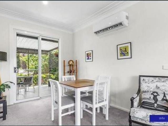 ELEVATED POSITIONED HOME MINUTES TO THE LAKE