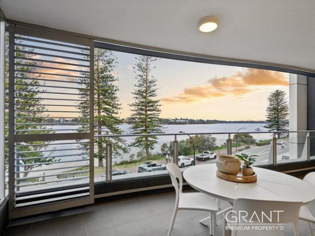 ELEVATED RIVERFRONT LIVING