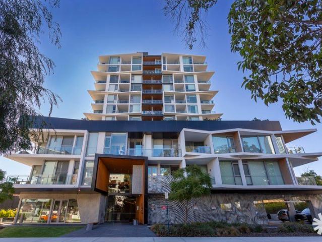 ELEVATED RIVERSIDE LIVING WITH STUNNING VIEWS