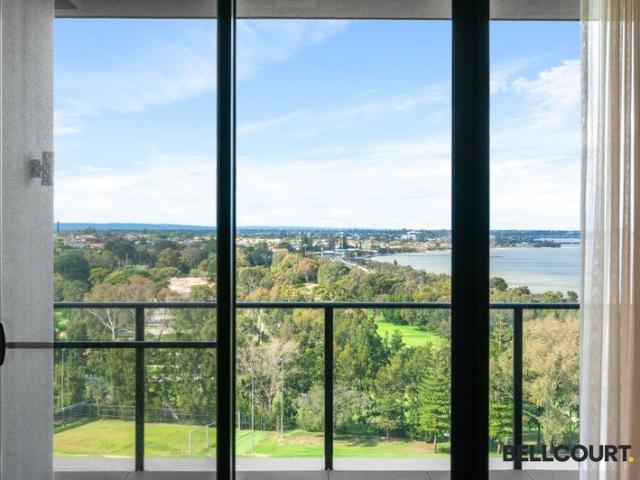 ELEVATED RIVERSIDE LIVING WITH SWEEPING VIEWS