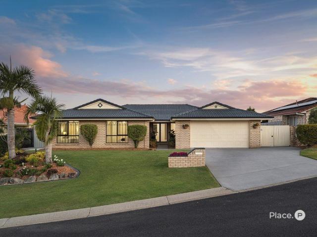 ELEVATED SINGLE LEVEL WITH VIEWS AND ENTERTAINING APPEAL