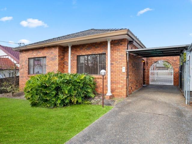 Elevated Solid Brick Four Bedroom Home with Renovation or Rebuild Potential STCA