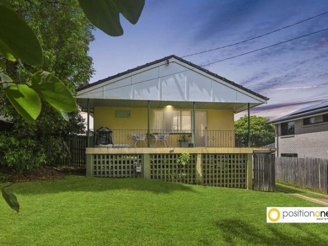 Elevated Sought after Location, Air Conditioned, Front Deck, Large Backyard
