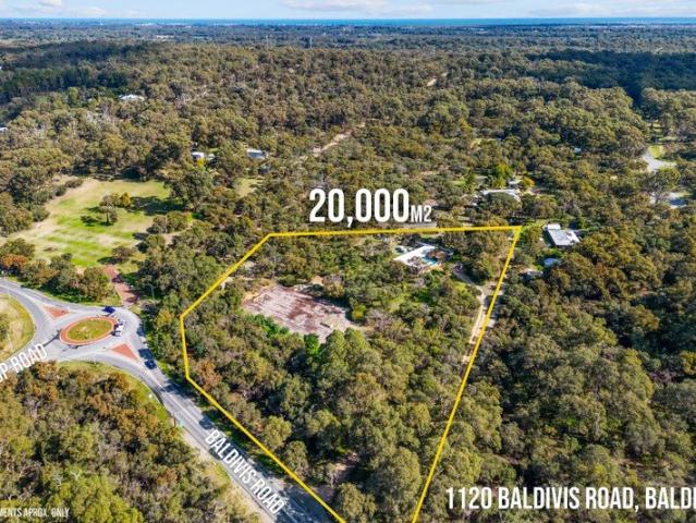 4.95 ACRES OF ELEVATED COUNTRY LIVING MINUTES FROM BALDIVIS