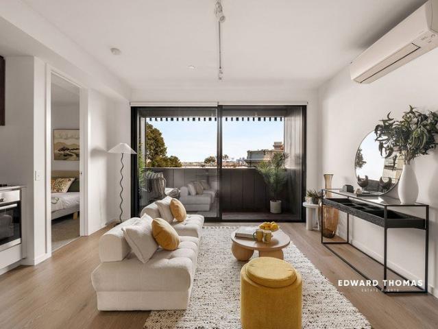 Elevated Style with a City Edge Outlook