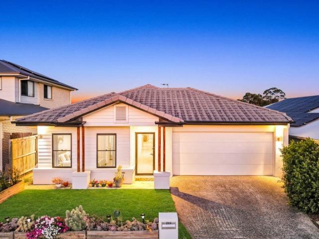 Elegant North Facing Family Living in a Premier Growth Corridor