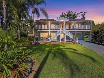 Elegant Acreage with Luxury Finishes & Resort Style Entertaining.