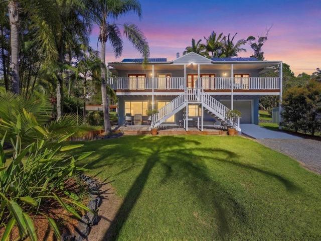 Elegant Acreage with Luxury Finishes & Resort Style Entertaining.
