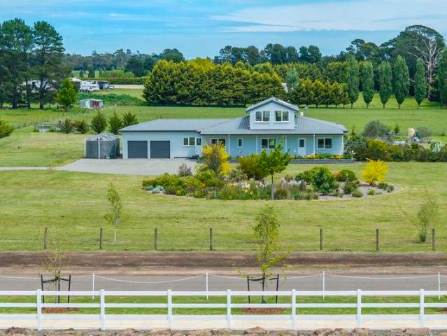 Elegant Country Living on 7 Acres of Space and Style