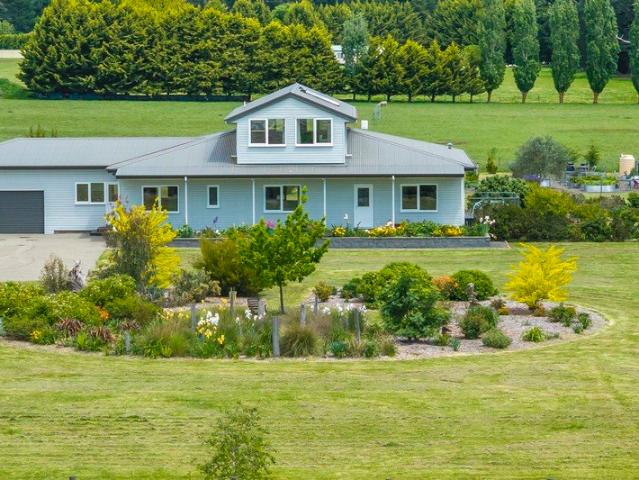 Elegant Country Living on 7 Acres of Space and Style