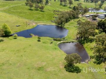 Elegant Country Living with Exceptional Equestrian Facilities on Approximately 46 acres