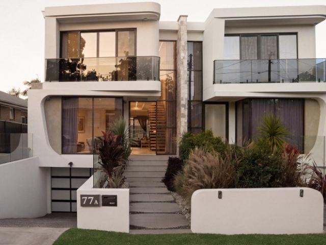 Elegant Duplex with Spacious Living and Inviting Pool