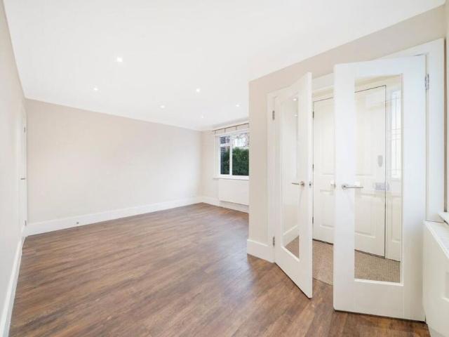 Elegant family home with generous living space, private gardens and parking in the heart of St John’s Wood