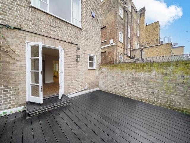 Elegant family home with generous living space, private gardens and parking in the heart of St John’s Wood
