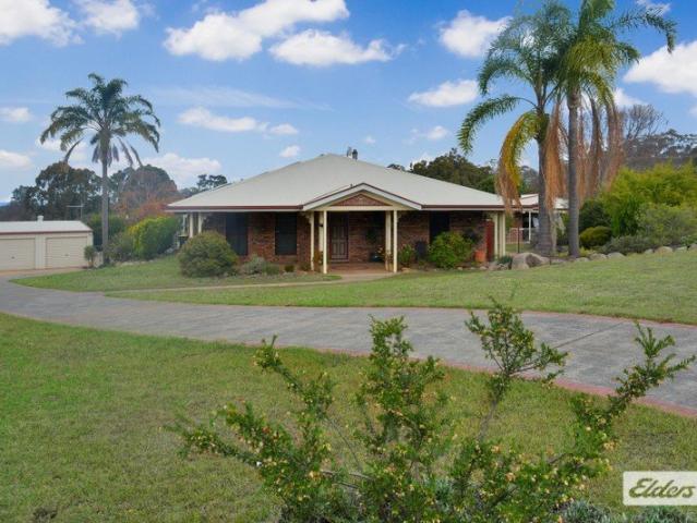 Elegant Family Home with Self Contained Studio & Extensive Shedding
