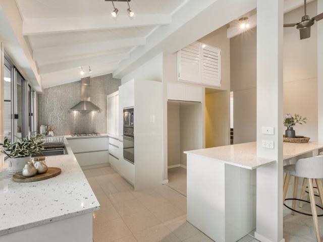 elegant family home with river views, pool & exceptional entertaining