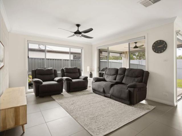 Elegant Family Living in a Tranquil Suburb