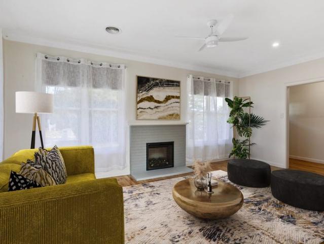 Elegant Family Living in a Spacious Brick Home