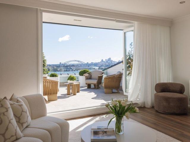 Elegant Light Filled Living with Dazzling Harbour Bridge Panorama