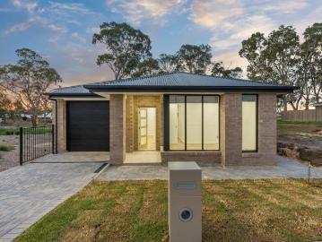 Elegant Low Maintenance Living in the Peaceful Adore Estate
