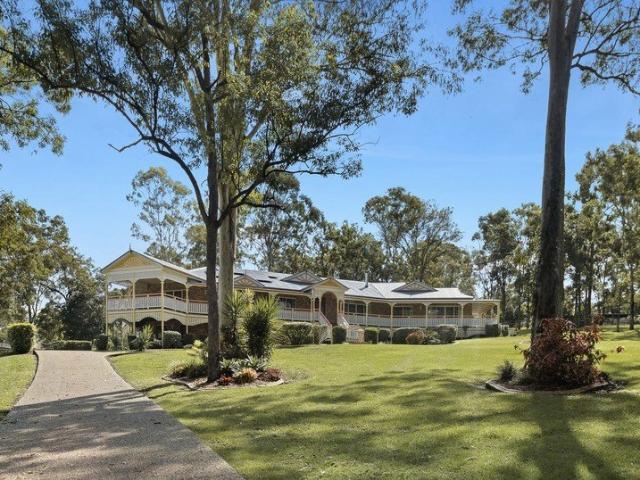 Elegant & Premium Acreage Living with Pool & Sweeping Views