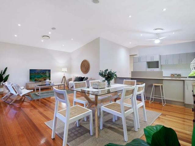 Elegant Queenslander With Dual Space Living