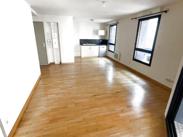 Élégant T2 de 54m2 avec Terrasse Couverte dans la Prestigieuse Copropriété BAYLE au Cœur Historique de FOIX