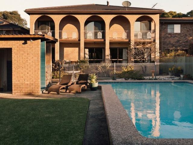 Elegant Two Story Residence with Scenic Views and Luxurious Outdoor Retreat