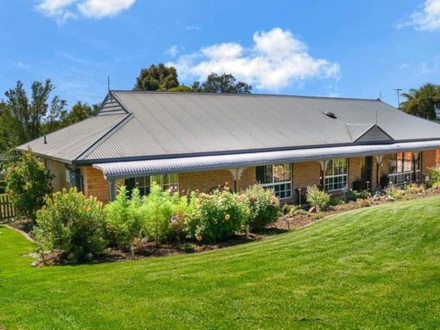 Elegant Trevallyn Retreat With an Inground Pool