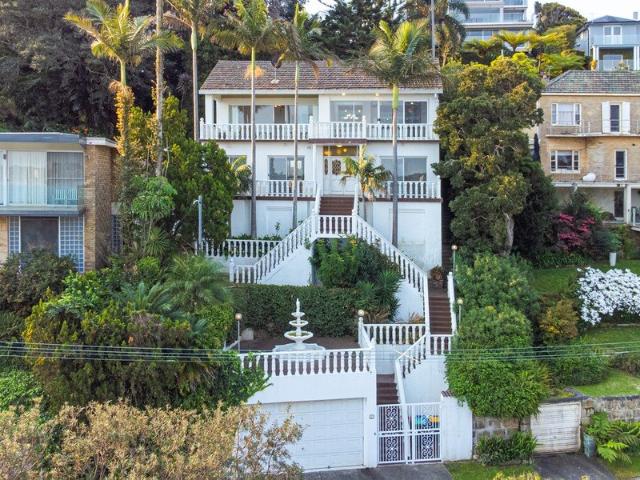 Elegant Waterfront Apartment with Timeless Charm