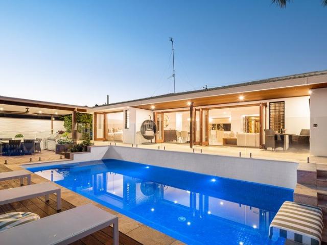 Elegant Waterfront Entertainer in an Exclusive Enclave