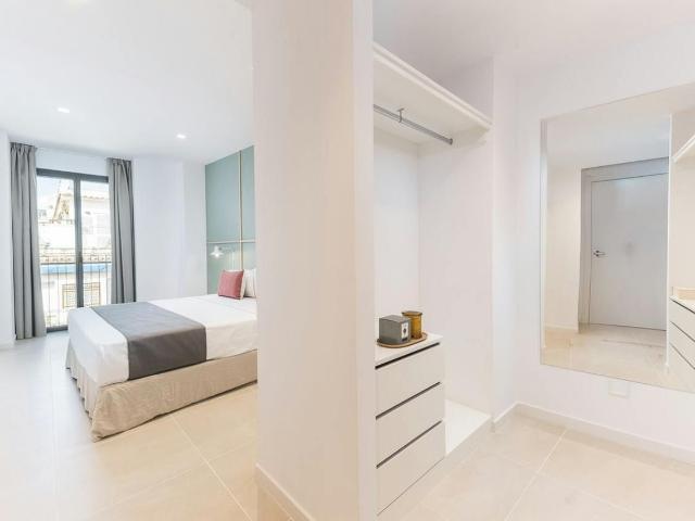 Elegant 2 Bedroom Apartment with Rooftop Terrace in Gràcia, Barcelona Amsterdam Apartments for Rent