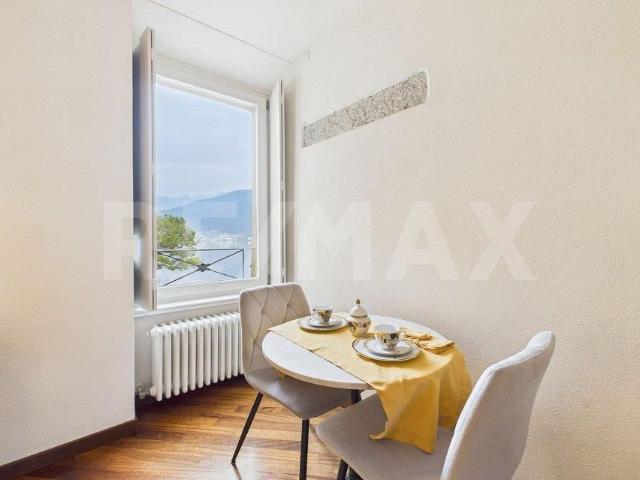 Elegante 1½ locali con vista lago a Morcote