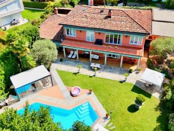 Elegante Villa mit prächtigem Pool und üppigem Garten in Caslano