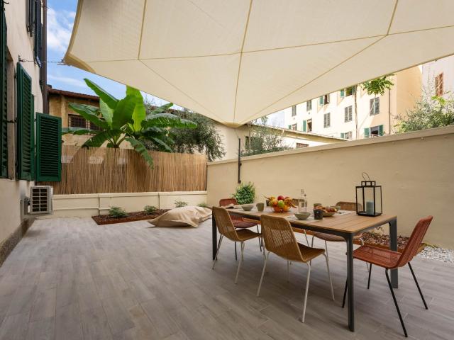 Elegante appartamento con 2 camere matrimoniali e giardino
