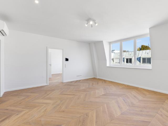Elegante Dachgeschosswohnung: Luxuriöses Wohnen über den Dächern Wiens