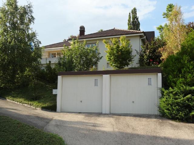 Élégante maison individuelle avec vue sur le lac et les Alpes à Auvernier