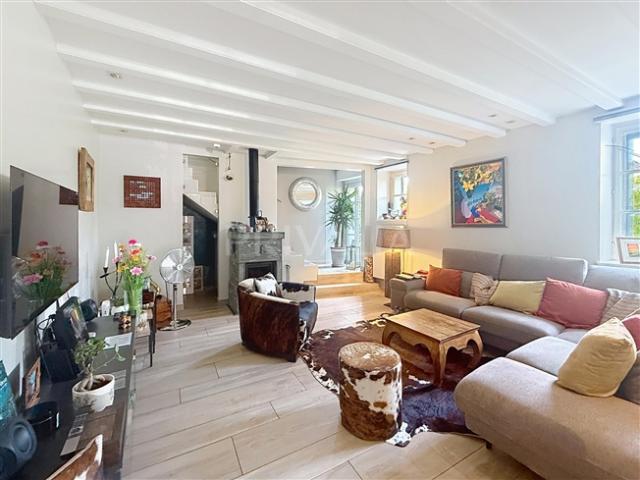 Eleganz und Komfort in einem Familienhaus mit Garten in Satigny