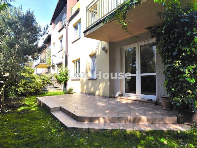 Elegancki 3 pokojowy apartament z ogródkiem i miejscami postojowymi