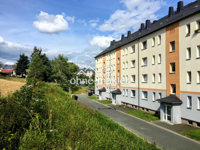Elterlein: Sonnige 3 Zimmer Wohnung mit großem Balkon und Einbauküche in ruhiger Neubauanlage