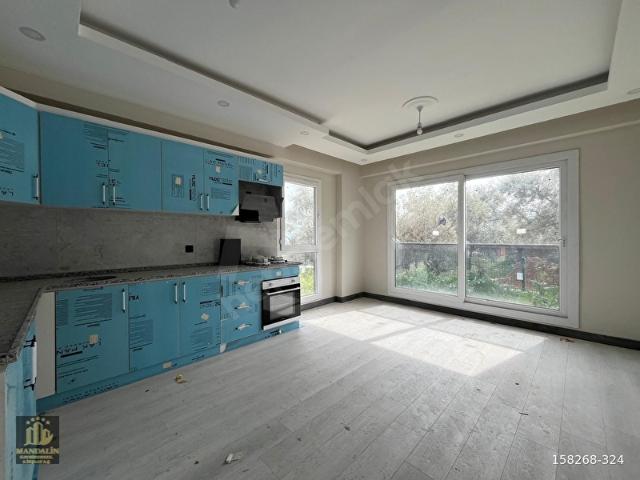 ELVAN ÖZÇELİK'DEN GÜMÜŞLÜK'DE SATILIK 2+1 BAHÇE KATI DAİRE