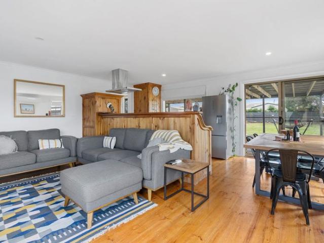 Embrace Relaxed Coastal Living in This Beautifully Maintained Three Bedroom Home