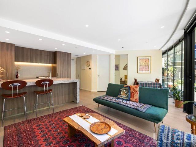 EMBRACE RESORT STYLE LIVING WITH AN EXPANSIVE PRIVATE GARDEN RETREAT